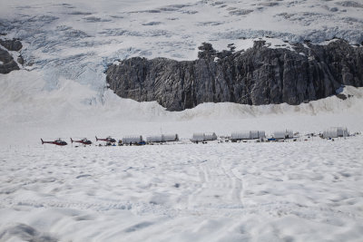 Helicopers, staff quarters and dog houses on the glacier