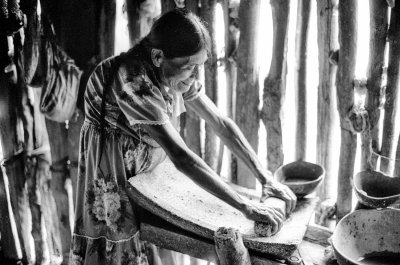 Grinding Corn on Metate