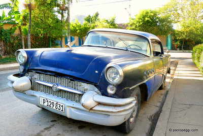 Alone in the street, at Pinar del Rio,Cuba...Maybe 1955 Buick Special 4-Door Sedan?