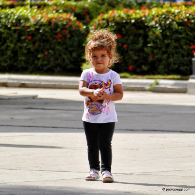 Cute Little Girl Playing. Cienfuegos, Cuba