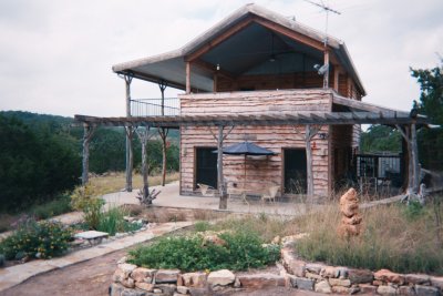 Side view showing upstairs porch