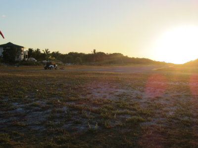 Airport landing strip at sunset
