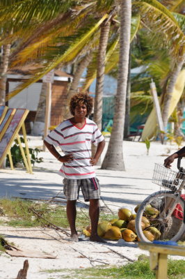A young vendor on the shore of Caye Caulker, Belize, C.A.