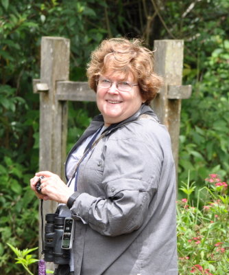 Mary enjoys the plants, butterflies and birds in the gallery garden.