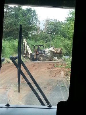 First we heard we were not going to be able to take the short road around Lake Arenal because the rains we'd been experiencing for the last couple of days had caused some mudslides that had blocked the road. Then Esteban got word that the road had been cleared, so we took off, only to find they were still clearing the road in places.
