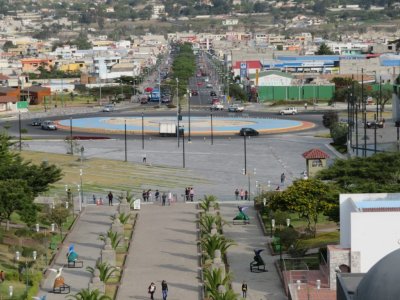 There is a huge traffic circle to the east.