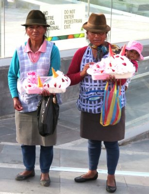 Local entrepreneurs selling confections outside the monument