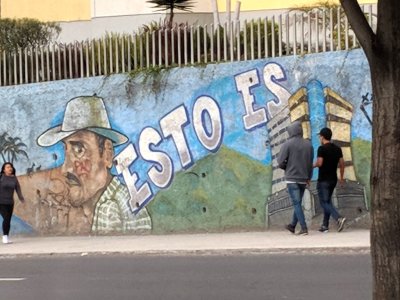 We rode on into Quito
where we saw street art declaring
This is...