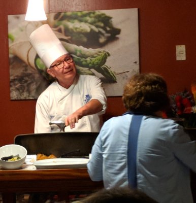 After finding the quetzals, we went back to the lodge for breakfast. The chef at Savegre Lodge, here serving Mary, was a jovial character.