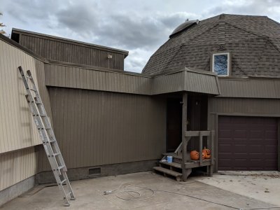 West side of the house with new siding and paint