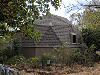 Front of the small dome with a new coat of paint on the new siding