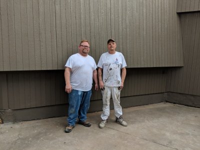 Paul (R) and his cousin and helper Shane (L), after painting the new siding.