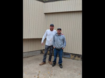 They were rushing to load up before the rain started, but I asked Jesse and Tim to pose in front of their work before they left.