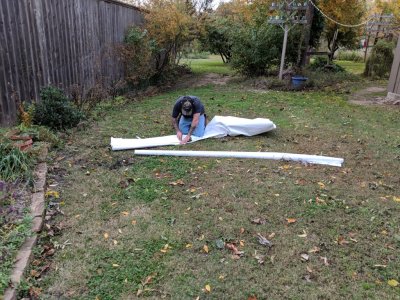 Tim cutting Tyvek to go on before the siding
