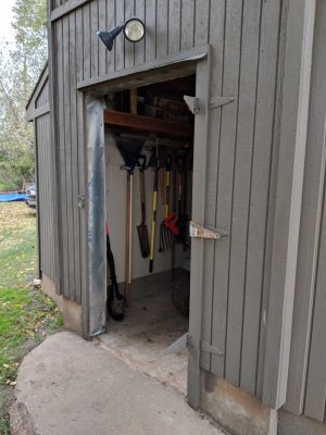 The shed door is very heavy, so I was happy to have them remove it and replace the exterior face.