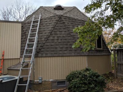 New panels, with the new bottom flashing showing, on the east side of the house