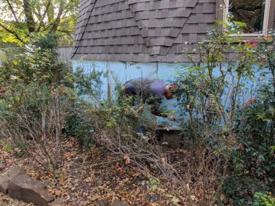 Tim working on the front of the house