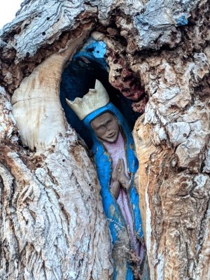 Figure carved into a tree stump