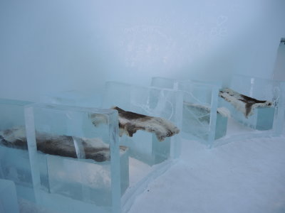 Benches in the bar (made only of ice, covered with reindeer hides)