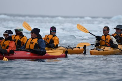 Kayaking through brash ice