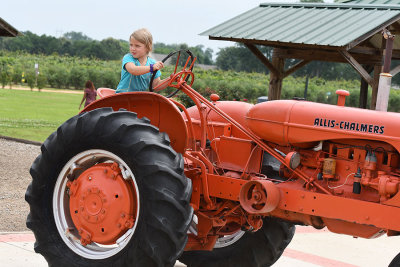 Hey, why is her tractor cooler than mine?