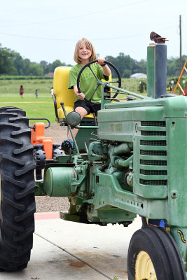 Kristina challenges Annie to a tractor race
