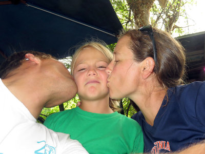 KJ gets parent kisses