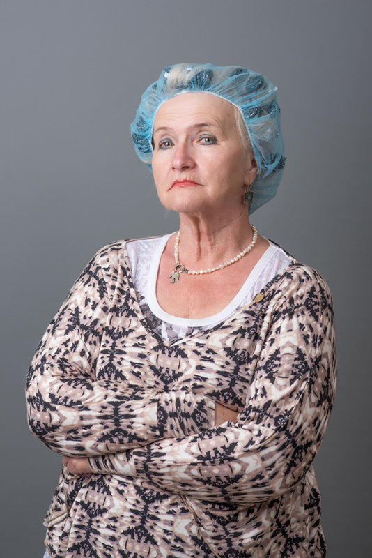 Portrait of a woman with curlers