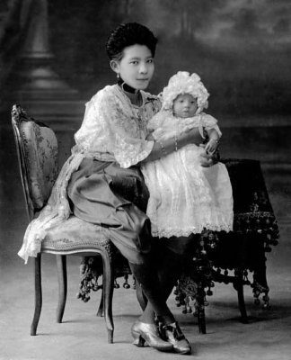 Wealthy woman with baby