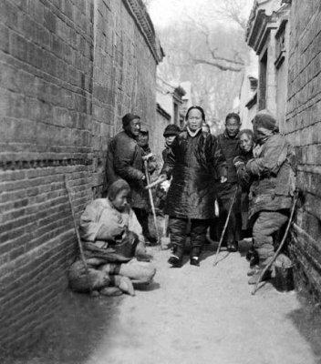 c. 1918 - Walking thru beggars to Temple