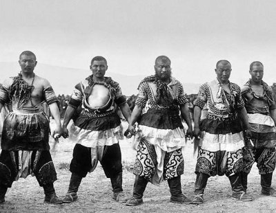1909 - Strongmen In traditional dress