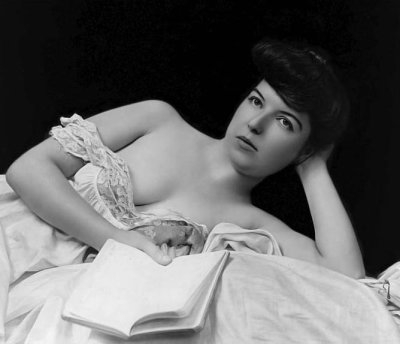 c. 1902 - Reading in bed