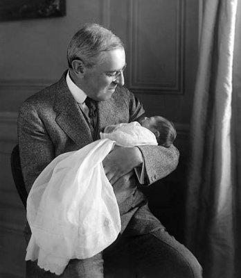 1915 - Woodrow Wilson with his new grandson