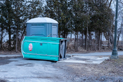 Portapotty knocked over on Keegan Parkway by high winds.