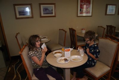Kids Eating Breakfast in Hotel
