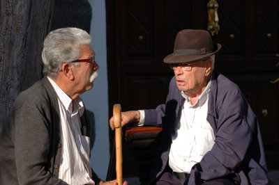 Quiet talks on the street