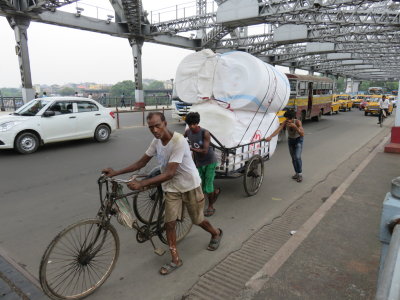 Kolkata walking across the Howrah bridge