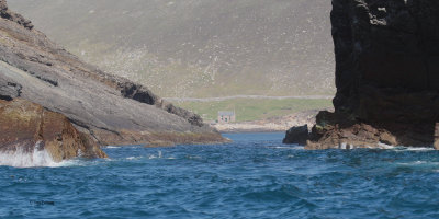 The Feather Store house through the gap between Hirta and Dun