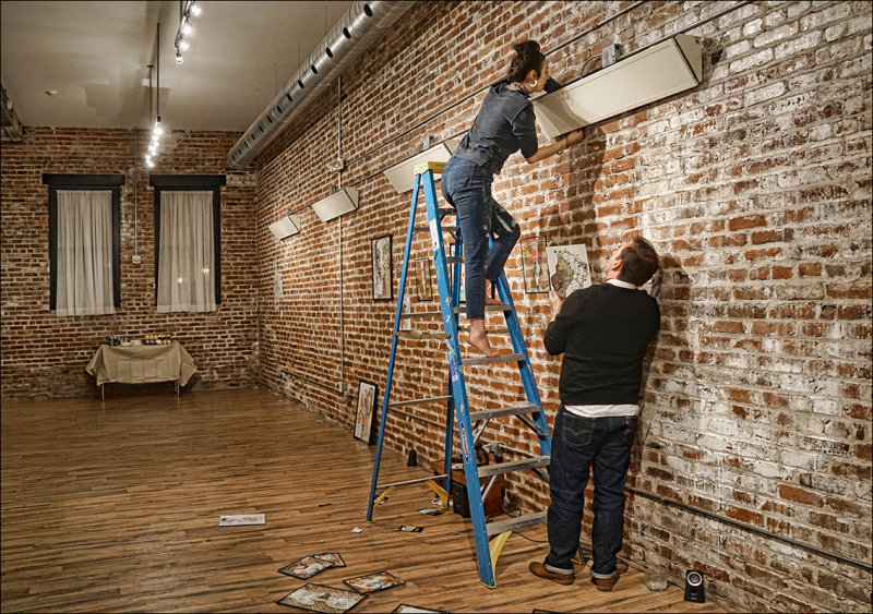 Hanging Her Exhibit