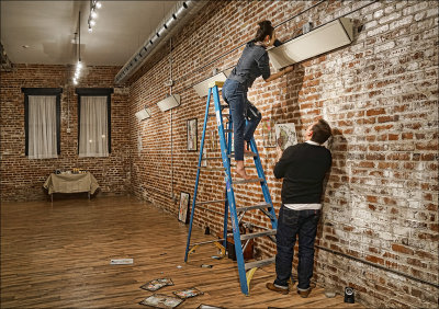 Hanging Her Exhibit