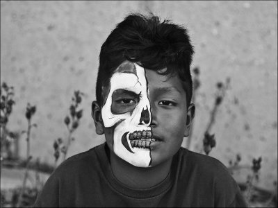 Boy With Painted Mask