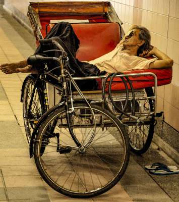 Singapore Trishaw Driver Resting