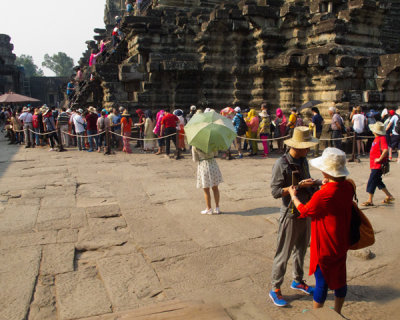 People Waiting in Line to Climb to the top of Angkor Wat Temple