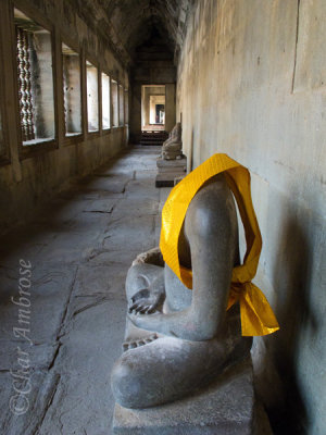 Gallery in Angkor Wat with Headless Buddhas