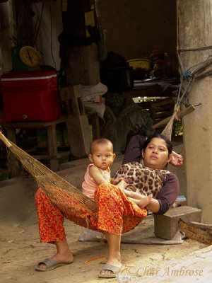 Mother and Baby Relaxing in a Hammock