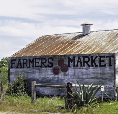 The Farmers Market sign.