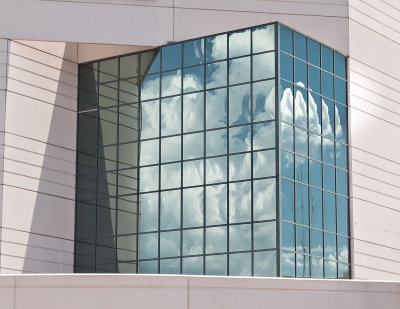 Large window with cloud reflection