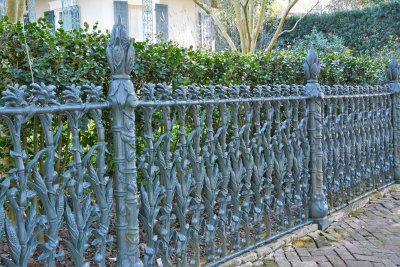 Mansion with the handcrafted Iron Corn Row Fence in the Garden District of New Orleans