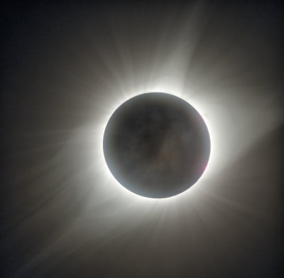 10 exposures combined to show maximum corona and effect of clouds and earthshine