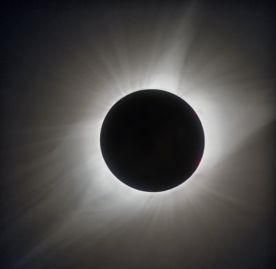 10 exposures combined to show maximum corona, but processed to remove clouds and earthshine from moon.